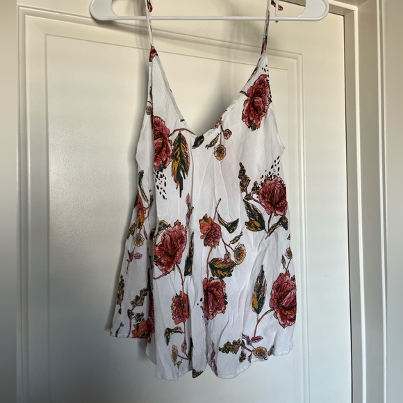 Floral tank top with spaghetti straps with ties at top. Size Large. Flowy/Light. - Picture 1 of 4